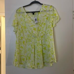 Beautiful peplum style blouse from Torrid. NWT